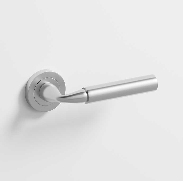 Neo · Manillas roseta para puerta en níquel satinado